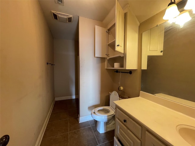 2127 Forest Hills Blvd, Haughton, LA 71037 - bathroom featuring tile patterned floors, toilet, baseboards, and vanity