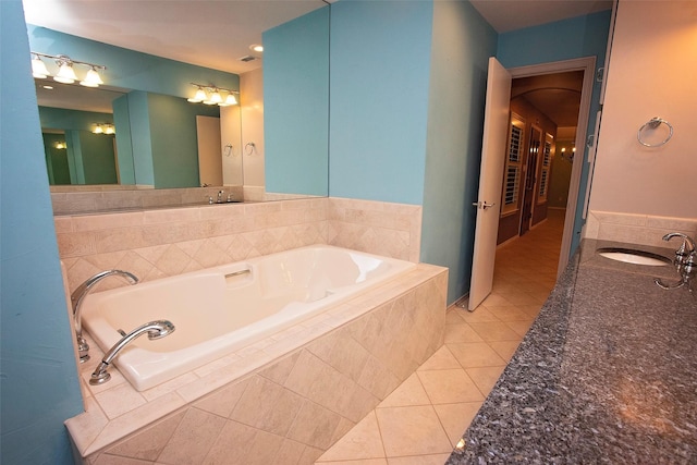 1305 Cliff Dr, Graham, TX 76450 - full bathroom with tile patterned flooring, vanity, and a bath