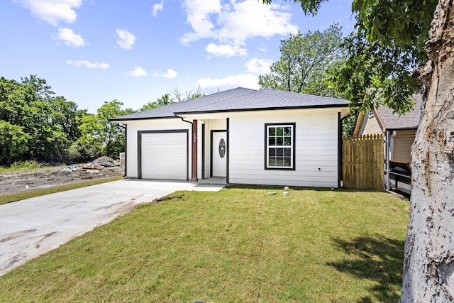 620 S First St, Sherman, TX 75090 - view of front facade featuring concrete driveway, an attached garage, and a shingled roof