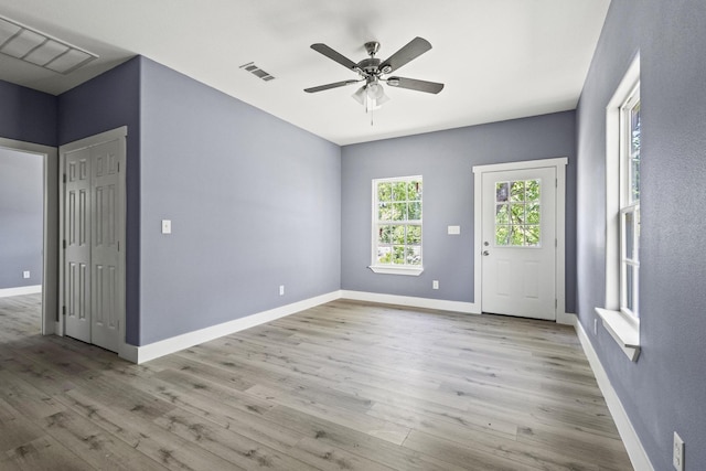 620 S First St, Sherman, TX 75090 - empty room featuring a ceiling fan, wood finished floors, and baseboards