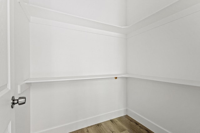 620 S First St, Sherman, TX 75090 - walk in closet with wood finished floors