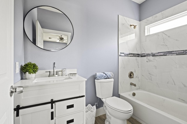 620 S First St, Sherman, TX 75090 - full bath featuring ceiling fan, vanity, toilet, wood finished floors, and bathing tub / shower combination