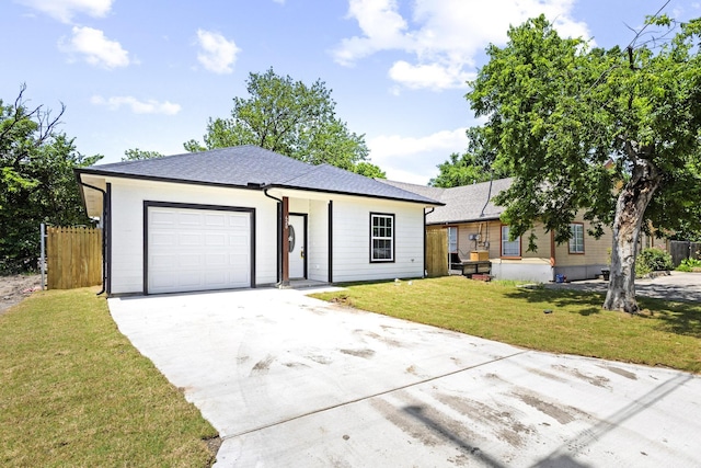 620 S First St, Sherman, TX 75090 - view of front of house featuring concrete driveway, an attached garage, and roof with shingles