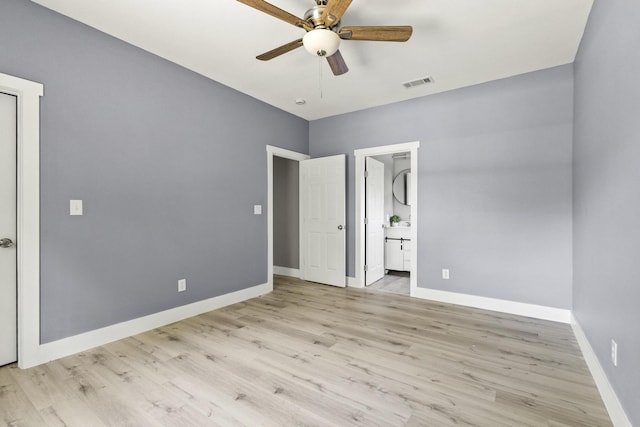 620 S First St, Sherman, TX 75090 - unfurnished bedroom with light wood-type flooring, baseboards, ensuite bathroom, and a ceiling fan
