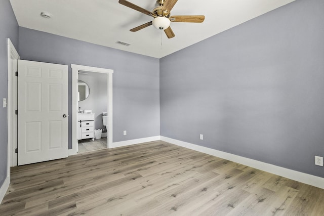 620 S First St, Sherman, TX 75090 - unfurnished bedroom featuring wood finished floors, baseboards, and a ceiling fan