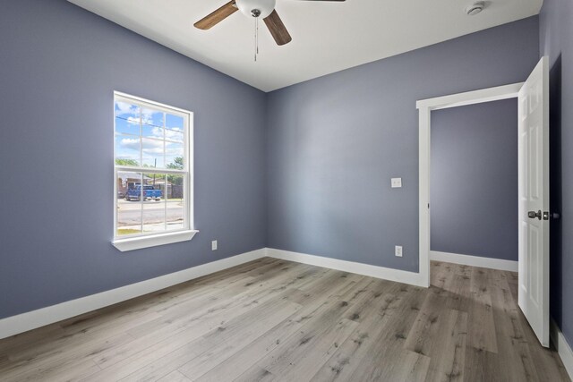 620 S First St, Sherman, TX 75090 - spare room with a ceiling fan, light wood-style flooring, a smoke detector, and baseboards
