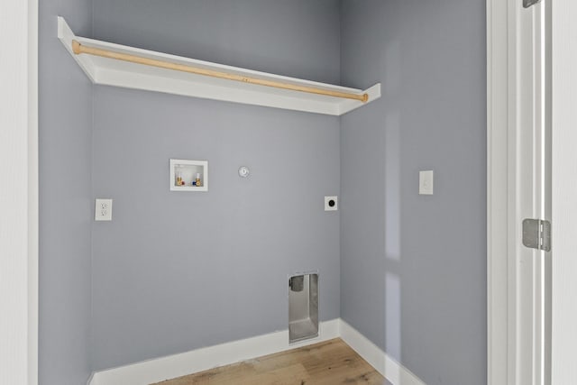 620 S First St, Sherman, TX 75090 - laundry room with electric dryer hookup, hookup for a washing machine, hookup for a gas dryer, wood finished floors, and baseboards