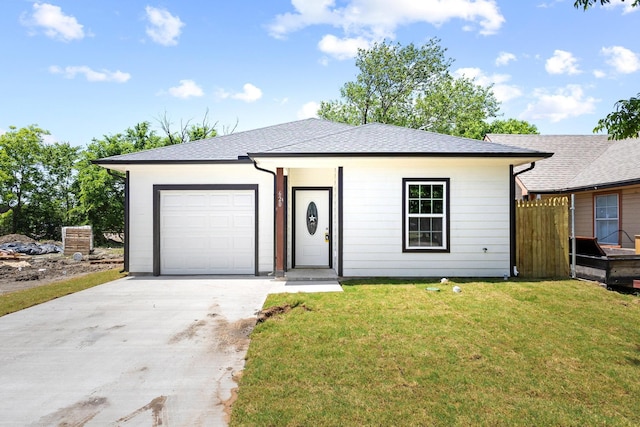 620 S First St, Sherman, TX 75090 - ranch-style home featuring concrete driveway, an attached garage, a front lawn, and a shingled roof
