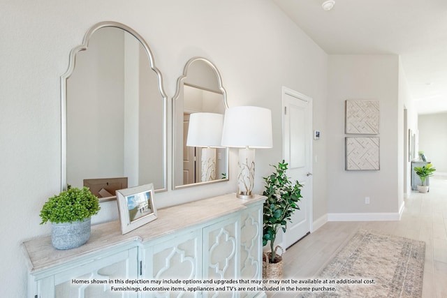 1286 Emily Dr, Trenton, TX 75490 - hallway with baseboards and light wood-style flooring