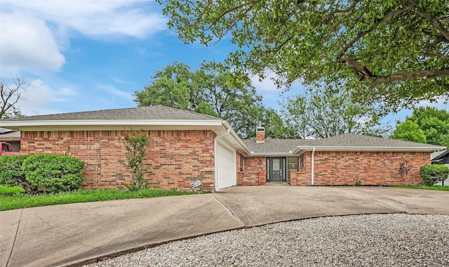 4032 Aragon Dr, Fort Worth, TX 76133 - view of front of property featuring an attached garage, brick siding, driveway, a chimney, and roof with shingles