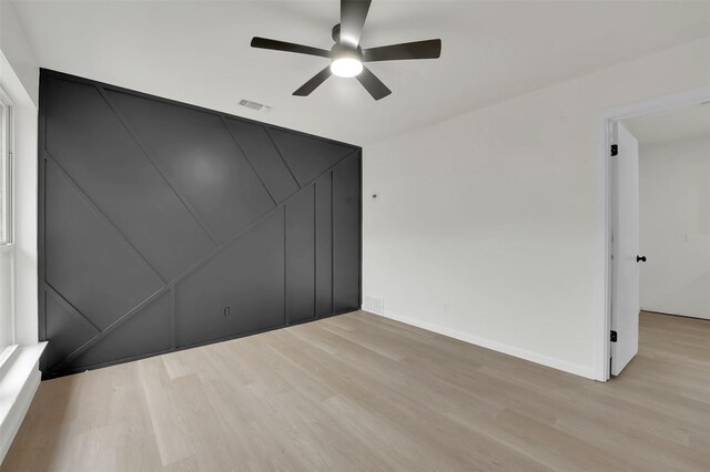 4032 Aragon Dr, Fort Worth, TX 76133 - unfurnished bedroom featuring light wood-style flooring, baseboards, and ceiling fan