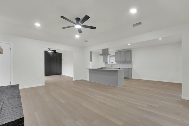 4032 Aragon Dr, Fort Worth, TX 76133 - unfurnished living room with a ceiling fan, light wood-style floors, baseboards, and recessed lighting