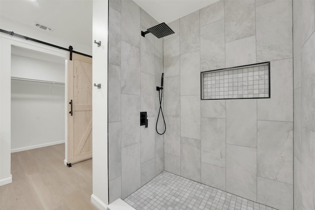 4032 Aragon Dr, Fort Worth, TX 76133 - full bathroom featuring wood finished floors and tiled shower