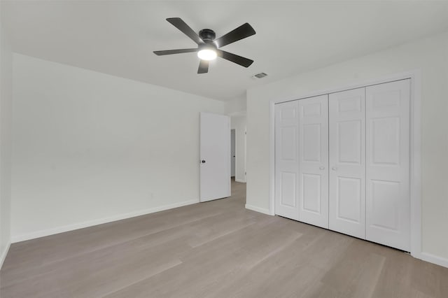 4032 Aragon Dr, Fort Worth, TX 76133 - unfurnished bedroom with light wood-type flooring, baseboards, a closet, and a ceiling fan