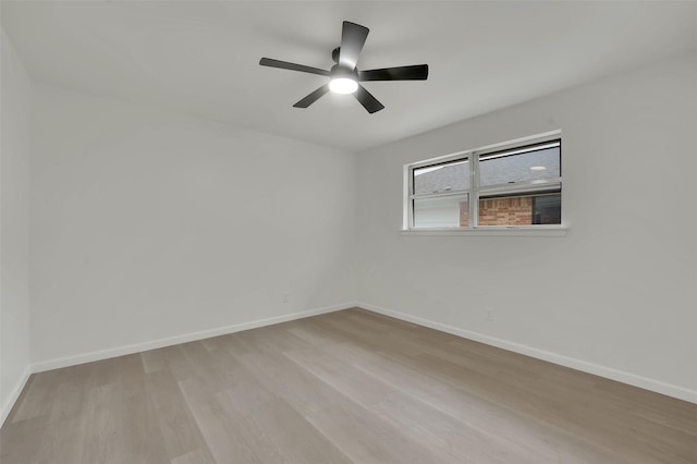 4032 Aragon Dr, Fort Worth, TX 76133 - unfurnished room with light wood-style flooring, baseboards, and ceiling fan