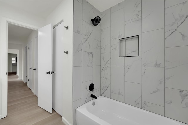 4032 Aragon Dr, Fort Worth, TX 76133 - bathroom featuring wood finished floors and bathtub / shower combination