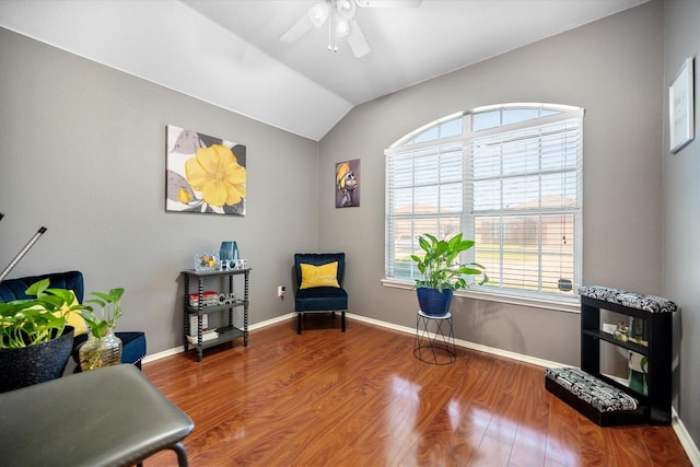7636 Hollow Forest Dr, Fort Worth, TX 76123 - sitting room with vaulted ceiling, a ceiling fan, wood finished floors, and baseboards