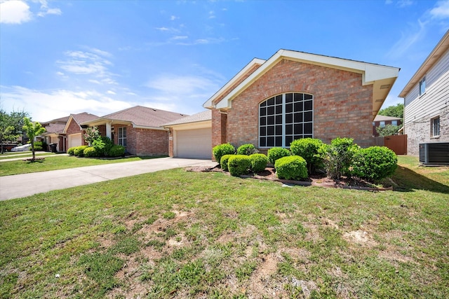 ranch-style home with brick siding, central AC unit, a garage, and driveway