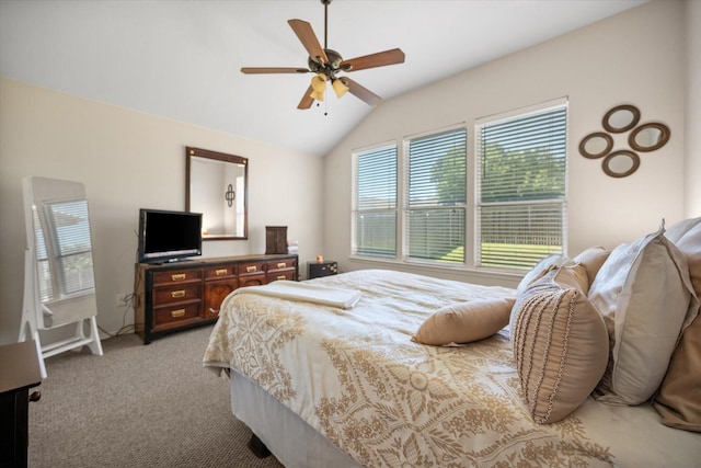 bedroom with lofted ceiling, carpet flooring, and ceiling fan