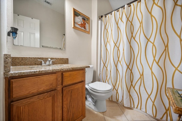 full bath featuring toilet, vanity, tile patterned flooring, and a shower with shower curtain