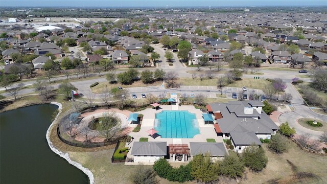 aerial view of residential area with a pool area