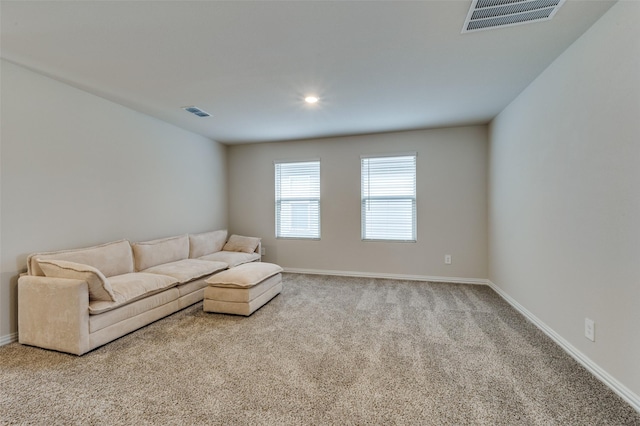 2665 Kings Canyon Mews, Corinth, TX 76210 - living area with carpet flooring, baseboards, and recessed lighting