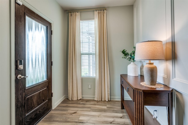 2665 Kings Canyon Mews, Corinth, TX 76210 - entryway with light wood-style floors and baseboards