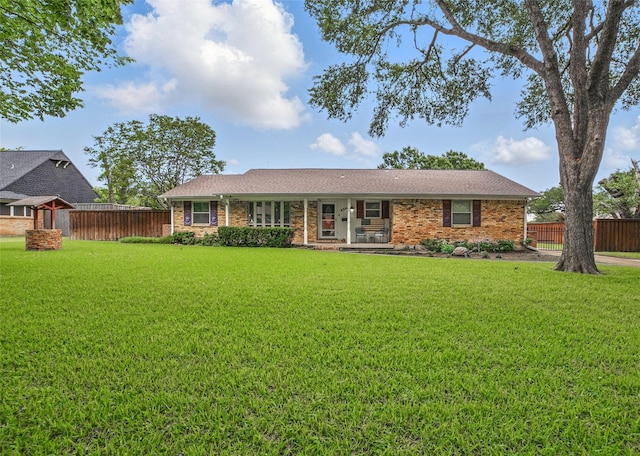 4548 Ivy Dr, Mesquite, TX 75150 - ranch-style home featuring brick siding and covered porch