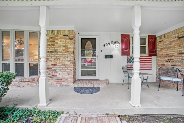 4548 Ivy Dr, Mesquite, TX 75150 - entrance to property featuring a porch and brick siding