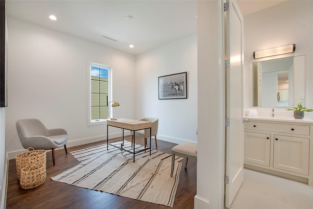 interior space with baseboards, light wood-style floors, and recessed lighting