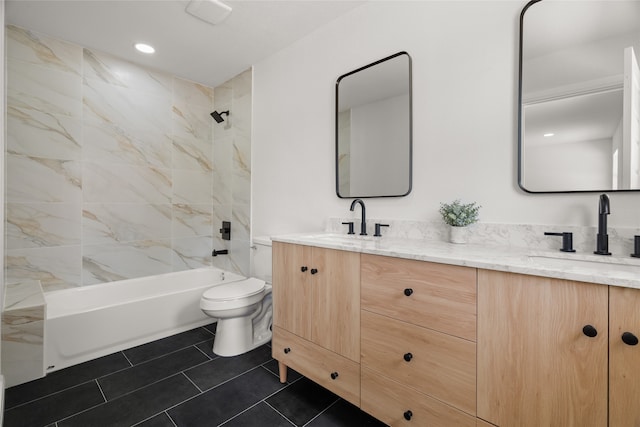 118 Mockingbird Ln, Hillsboro, TX 76645 - bathroom featuring toilet, double vanity, washtub / shower combination, and tile patterned floors