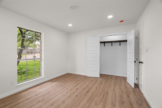 118 Mockingbird Ln, Hillsboro, TX 76645 - unfurnished bedroom featuring wood finished floors, baseboards, recessed lighting, and a closet