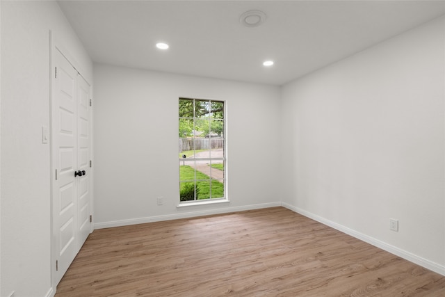 118 Mockingbird Ln, Hillsboro, TX 76645 - empty room with light wood finished floors, recessed lighting, and baseboards