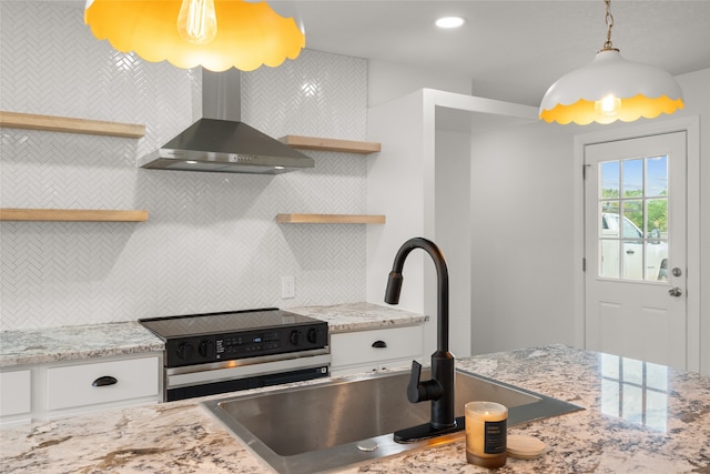 118 Mockingbird Ln, Hillsboro, TX 76645 - kitchen featuring open shelves, range with electric cooktop, wall chimney range hood, decorative backsplash, and white cabinets