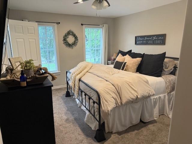 bedroom with carpet floors and ceiling fan