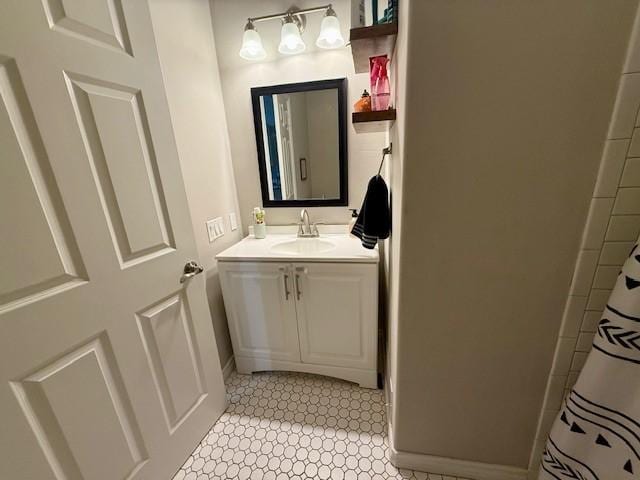 bathroom featuring vanity and a shower with curtain