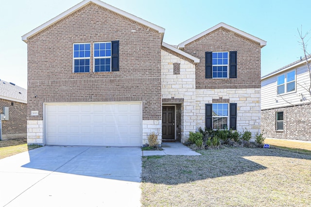 traditional-style home featuring brick siding, stone siding, a garage, and concrete driveway