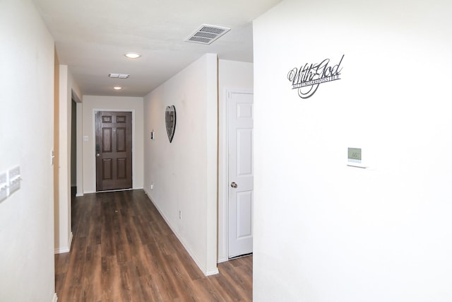 hall with wood finished floors, baseboards, and recessed lighting