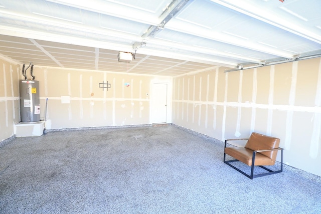 garage featuring water heater and a garage door opener
