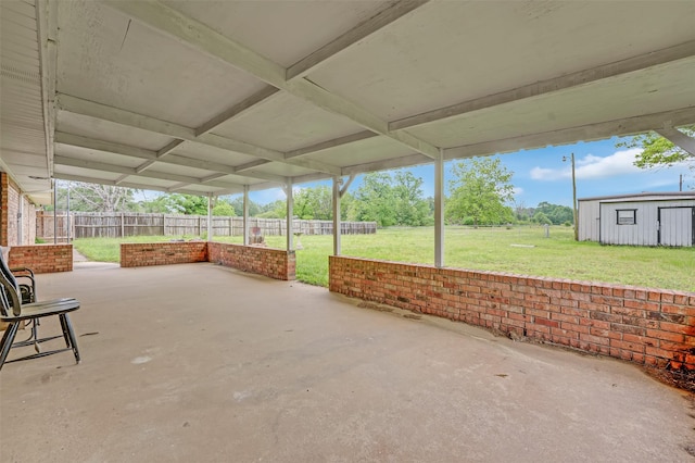 23010 County Road 3313, Chandler, TX 75758 - view of patio featuring a shed and an outbuilding