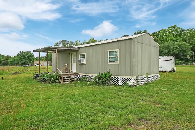 23010 County Road 3313, Chandler, TX 75758 - rear view of house featuring a lawn and a deck