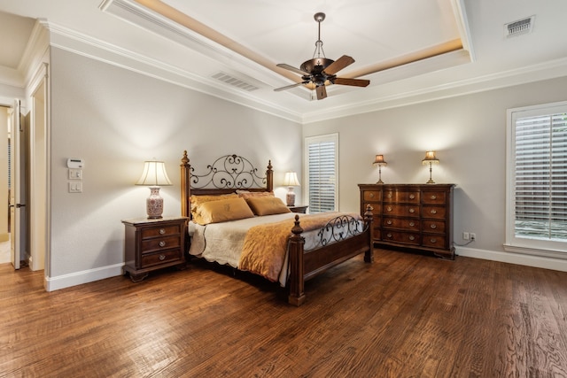 5957 Aberdeen Pl, Frisco, TX 75034 - bedroom with a raised ceiling, crown molding, baseboards, wood finished floors, and ceiling fan