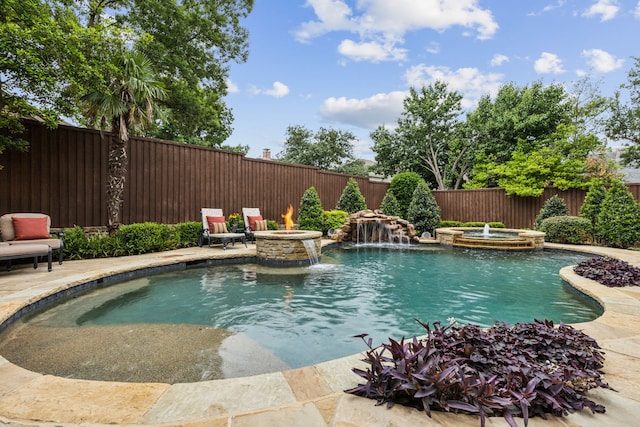 5957 Aberdeen Pl, Frisco, TX 75034 - view of swimming pool with a fenced backyard, an outdoor fire pit, a pool with connected hot tub, and a patio area