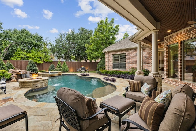 5957 Aberdeen Pl, Frisco, TX 75034 - view of pool featuring an outdoor fire pit, a patio area, an in-ground hot tub, and a fenced backyard