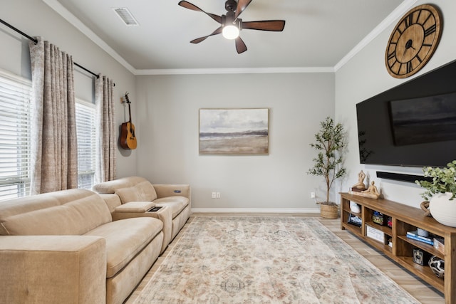 9529 Cholla Cactus Trl, Fort Worth, TX 76177 - living area featuring ceiling fan, ornamental molding, light wood-style flooring, and baseboards