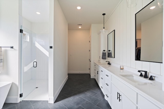 109 Old Decatur Rd, Decatur, TX 76234 - full bathroom with a shower stall, double vanity, baseboards, recessed lighting, and a soaking tub