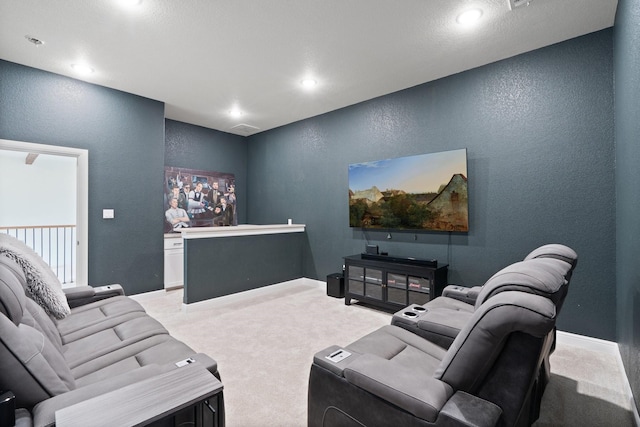 109 Old Decatur Rd, Decatur, TX 76234 - carpeted living room featuring a textured wall, baseboards, and recessed lighting