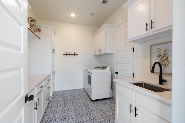 109 Old Decatur Rd, Decatur, TX 76234 - laundry room with cabinet space, baseboards, recessed lighting, and washer and dryer