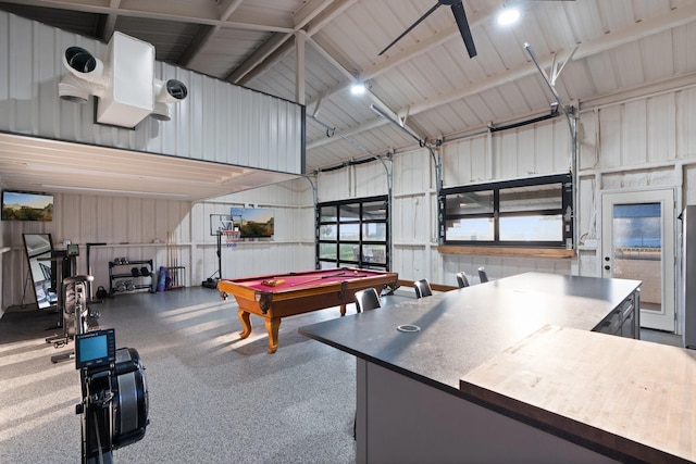 109 Old Decatur Rd, Decatur, TX 76234 - rec room featuring lofted ceiling, metal wall, billiards, and a garage
