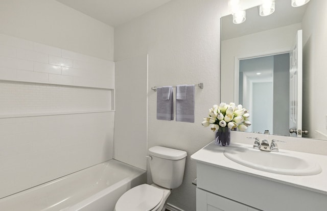 full bath featuring toilet, vanity, and bathing tub / shower combination